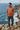 Rust mountain hoodie styled with charcoal cargo trousers