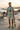 Sage ODDSON tee at a seaside skate park