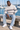 Seated marina menswear look with light-wash jeans