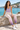 Seated seaside look with a lilac tank