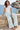 Seated seaside look with a white tee
