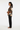 Side profile with black pants