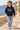 Six-year-old boy in the navy LittleChaps hoodie