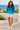 Sweatshirt styled simply with shorts, no accessories