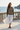 Sweatshirt with a white midi skirt