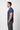 T-shirt with charcoal cargo pants side