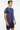 T-shirt with navy boardshorts side