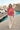Tie-dye hoodie styled at a Mediterranean marina