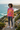 Tie-dye hoodie styled on a coastal path