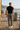 Track pants seaside back-view editorial