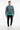 White male model with bomber and black joggers, white sneakers