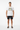 White Tropical ALPPEER Tee with Black Boardshorts - Full Body