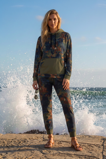 Woodland hoodie and jogger set beside ocean