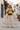 Yellow and navy hoodie styled with cream linen trousers