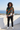 Zipped jacket on a coastal rooftop