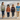Four kids together on the beach