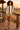 African female model on a safari observation deck in khaki shorts