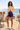 Alppeer-Mauve Shorts with cream sweater at coastal café