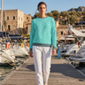 Aqua sweatshirt with white linen pants