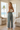Back view of palm-print pajama pants on model