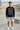 Black sweatshirt with denim shorts