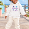 Black two-year-old girl in the white LittleChaps space hoodie