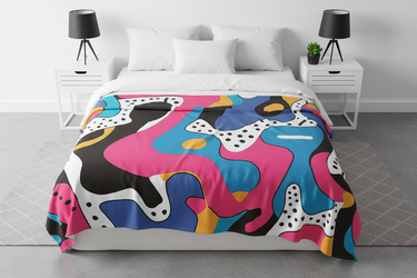 Blanket as colorful accent on white bed