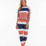 Blonde model wearing striped joggers with her original sweatshirt