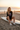 Blonde woman surfboard
