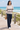 Boardwalk look with tailored navy trousers