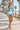 Boardwalk: sun-hat blonde woman