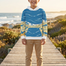 Boy wearing the hoodie with tan chinos