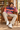 Brown-haired male model in a reading-chair look