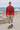 Cardinal with loose khaki cargo shorts