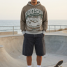 Charcoal denim shorts at a skate plaza