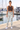 Charcoal tank and camo leggings at the marina