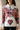 Close-up editorial of the Petal Love hoodie’s chest artwork
