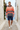 Coastal alley editorial with navy shorts