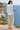 Coastal back-view look with sand trousers