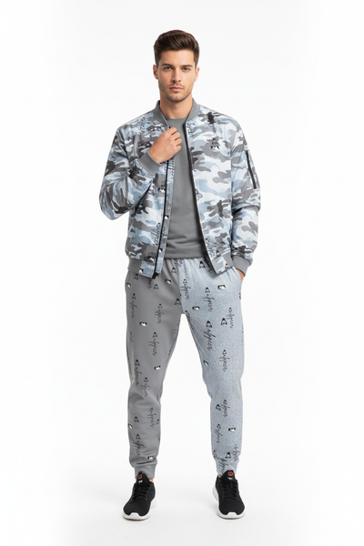 Coordinated with matching abstract camo bomber