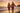 Couple on beach at sunset
