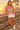 Dusty-rose surf-van sweatshirt on a female model