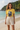 Exact yellow shirt at a tropical cove