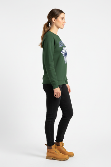 Female model in bottle green crewneck with black jeans