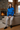 Female model in chalet lounge with light grey joggers