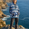 Female model in Ridgeline hoodie at ocean overlook