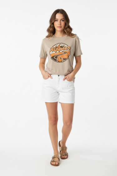Female model in tan tee with white shorts