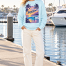 Female model in the sky-blue Surfxion sweatshirt