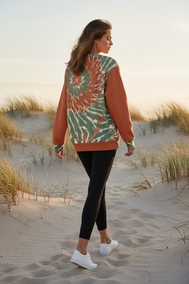 Female model showcasing the sweatshirt back with black leggings