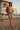 Female model wearing the sweatshirt with light-wash denim shorts